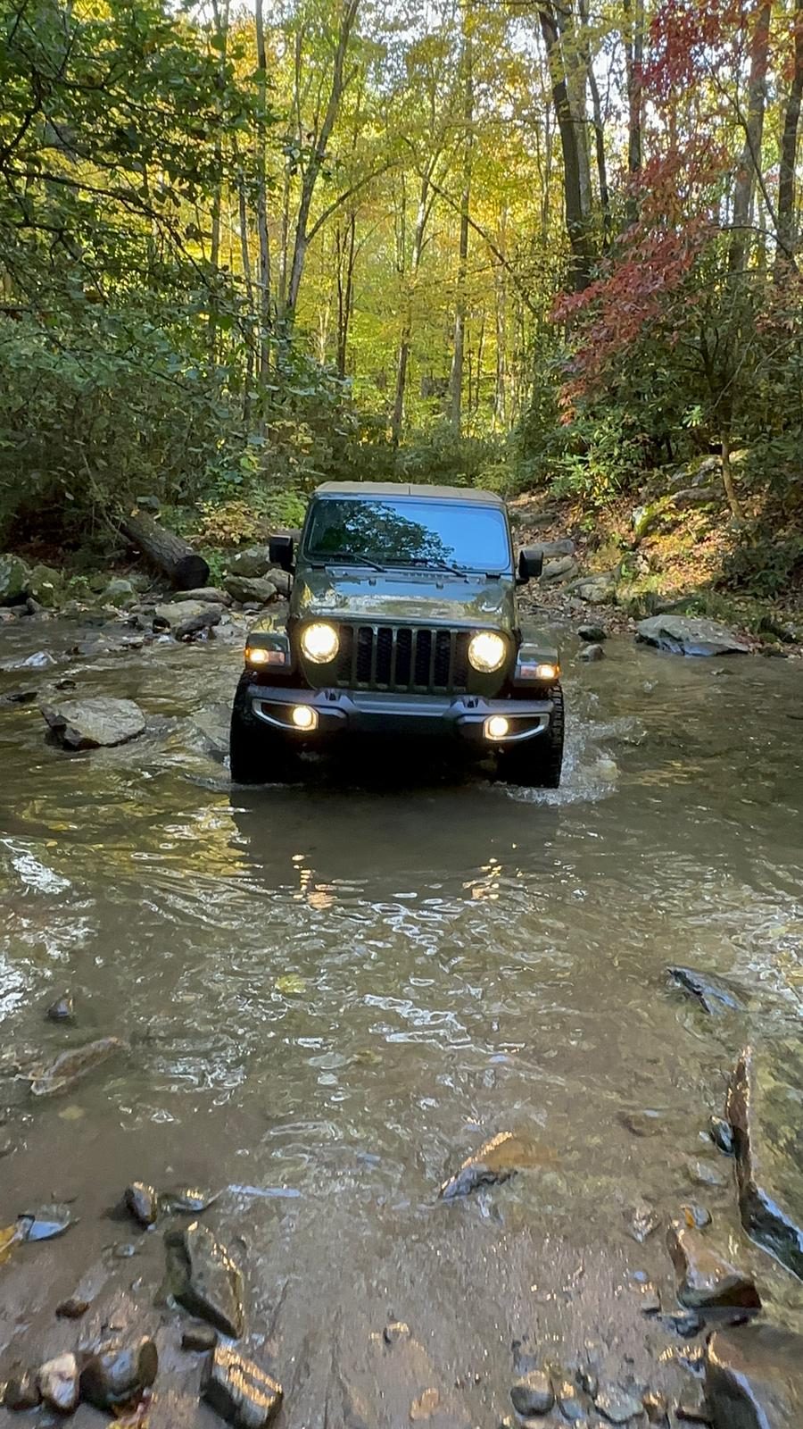 Foothills Jeep Tours Wrangler carefully crossing a North Carolina High Country creek